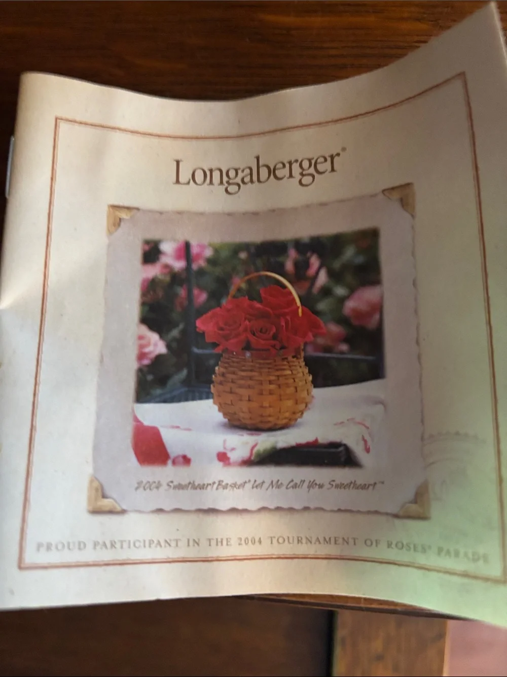 Longaberger 2004 Tournament of Roses Basket with lid, liner, protector.